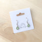 Des boucles d'oreilles